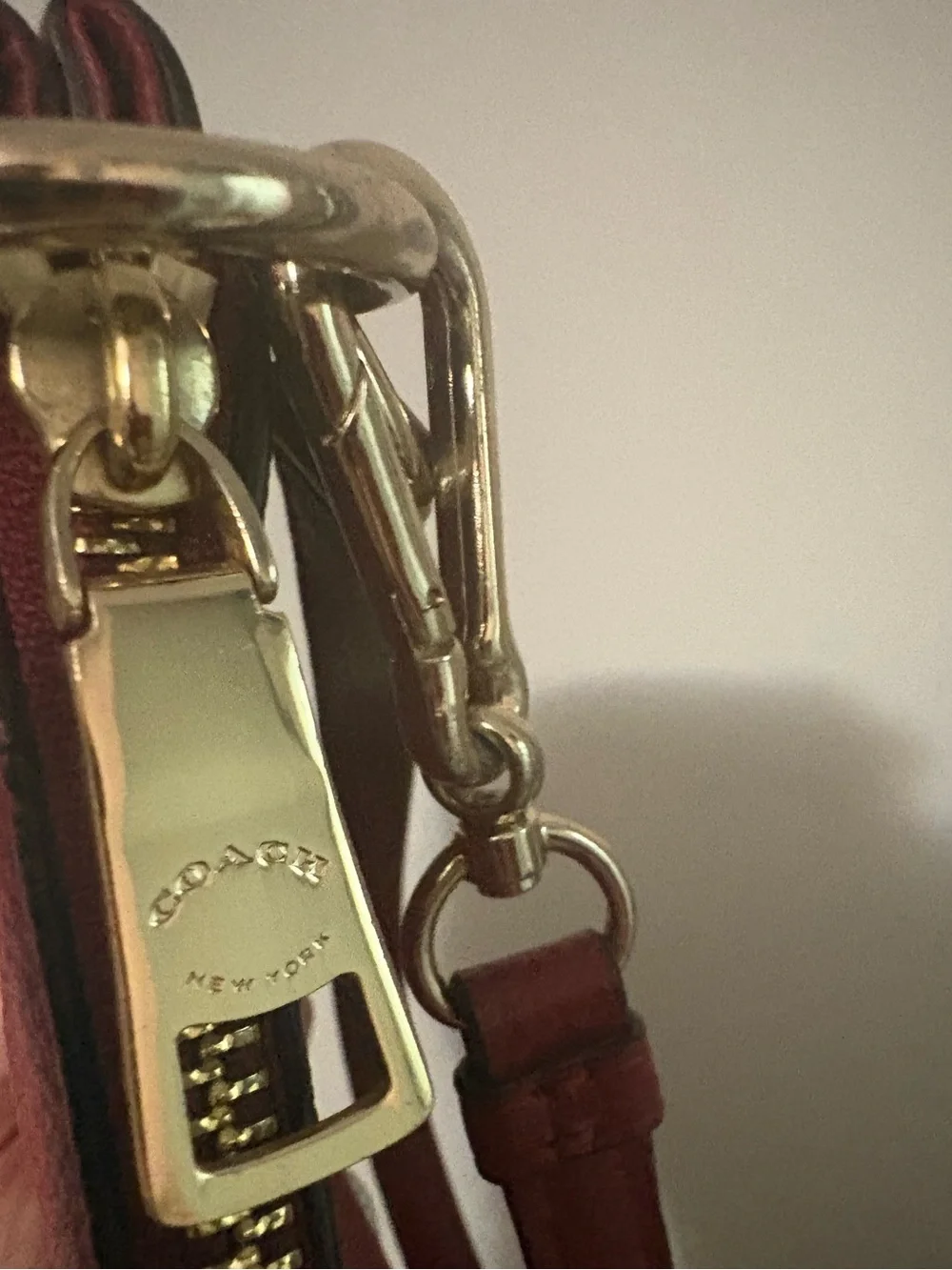 Coach embossed horse & carriage Pebbled Leather Charley pochette or Crossbody